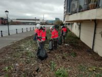 Charles Brand Team carry out litter pick along the River Lagan